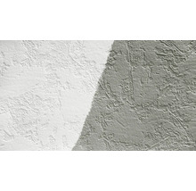 Nahaufnahme einer Wand mit Kratzputzstruktur