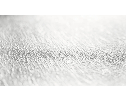 Nahaufnahme einer strukturierten, hellen Oberfläche