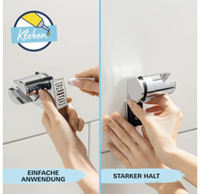 Duschkopfhalterung wird mit Kleber an der Wand befestigt