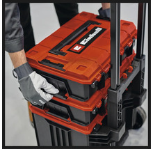 Person öffnet einen Einhell Werkzeugkoffer-Trolley mit mehreren Boxen