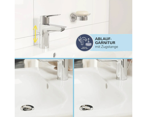 Auf einem Waschbecken sind ein Wasserhahn und ein Seifenhalter zu sehen, mit Informationen zum Ablaufgarnitur mit Zugstange.