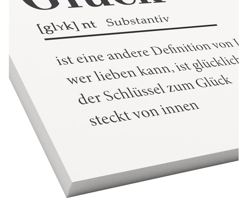 Dekoration mit dem Text: Definition von Glück