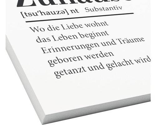 Dekoratives Wandbild mit dem Text Wo die Liebe wohnt, das Leben beginnt.