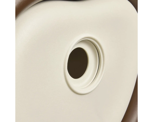 Detailansicht einer Sanitärkeramik mit einer runden Öffnung