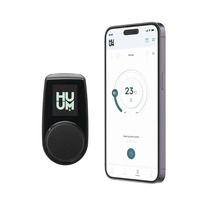 Huum Steuerungseinheit und Smartphone mit Huum App zur Heizungssteuerung