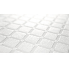 Nahaufnahme einer Matratzenoberfläche mit quadratischem Muster