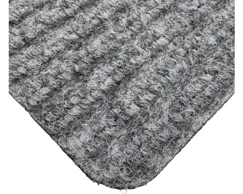 Detailansicht eines grauen Teppichs mit strukturierter Oberfläche