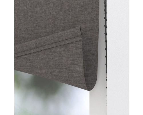 Detailansicht eines grauen Faltrollos mit Kettenzug