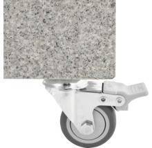 Detailaufnahme einer Lenkrolle mit Feststellbremse unter einer Platte