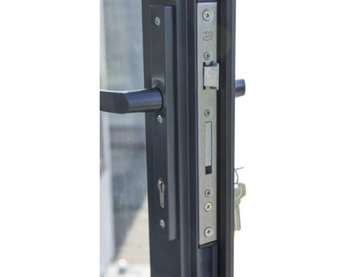 Nahaufnahme eines Türschlosses mit Griff und Schlüsseln