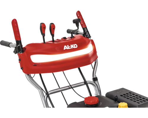 Detailansicht einer Schneefräse der Marke AL-KO mit Bedienelementen und Griffen.