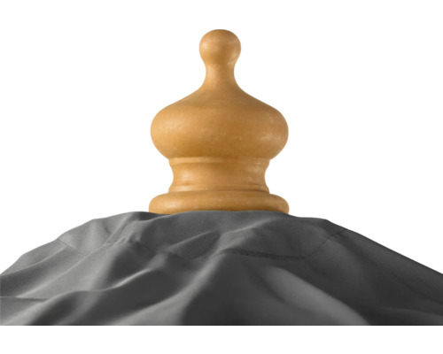 Holzaufsatz auf grauem Stoff