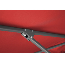 Detailansicht des Gestells und des roten Stoffdachs eines Pavillons.