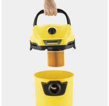 Kärcher Logo auf einem gelben Staubsauger, bei dem der Filter ausgetauscht wird