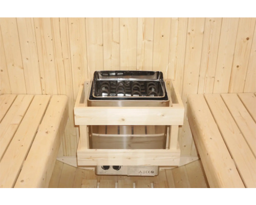 Saunaofen aus Edelstahl mit Holzverkleidung in einer Sauna