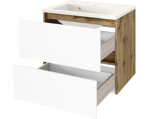 Waschbeckenunterschrank in Holzoptik mit zwei geöffneten weißen Schubladen und integriertem weißen Waschbecken.