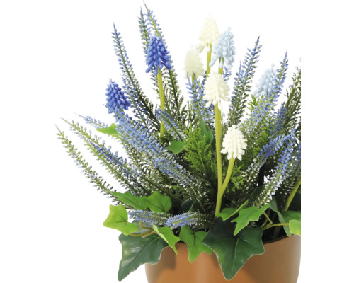 Künstliche Blumengesteck mit blauen und weißen Blüten im Topf
