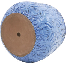 Blauer Blumentopf mit Loch im Boden