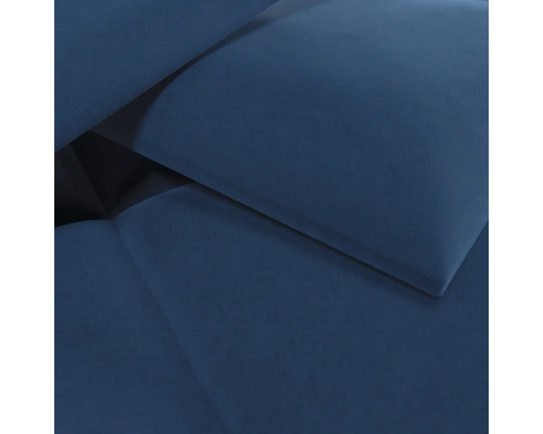 Detailansicht eines blauen Polsterstoffs mit weicher Textur.