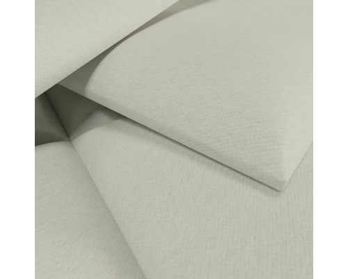 Detailansicht einer hellen, strukturierten Tapete mit feiner Oberflächenstruktur.