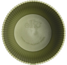 Ansicht von oben in einen runden elho Blumentopf aus recyceltem Kunststoff mit geriffelter Innenseite und elho Logo.