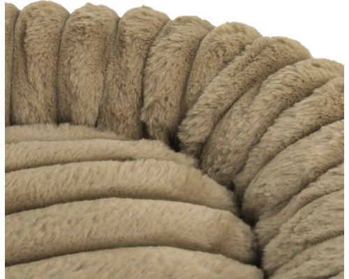 Detailaufnahme eines weichen, plüschigen Materials mit Rippenstruktur in Beige für ein Tierbett.