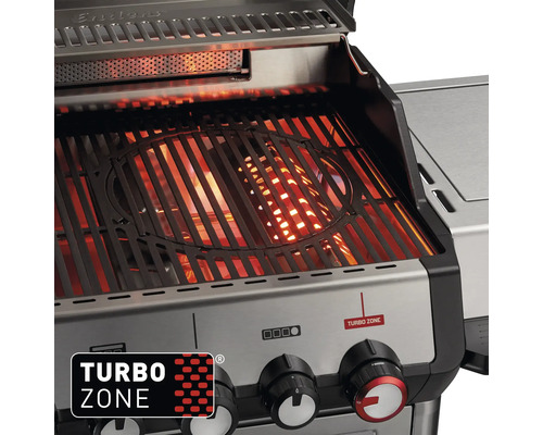 Nahaufnahme eines Gasgrills mit glühender Turbo Zone unter dem Grillrost und Edelstahlgehäuse mit Drehknöpfen.