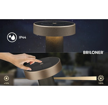 Briloner Logo. Solar Tischleuchte mit IP44 Schutzart und Touchdimmer von 10 bis 100 Prozent.