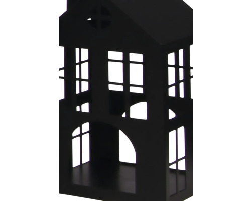 Dekoratives Haus aus schwarzem Metall mit ausgeschnittenen Fenstern und Türen.