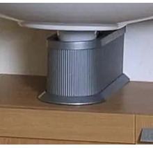 Siphonverkleidung aus Kunststoff mit gerippter Oberfläche unter einem Waschbecken auf einem Unterschrank.