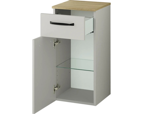 Badezimmerunterschrank mit einer Lade und einer Tür, inklusive Glaseinlegeboden und oberer Platte in Holzoptik.