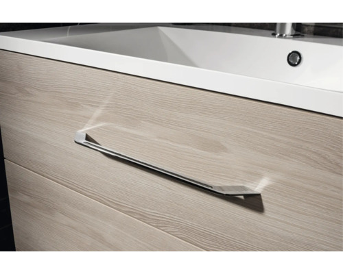 Waschtischunterschrank mit integriertem Waschbecken und einer Schublade mit langem Chromgriff in Holzoptik.