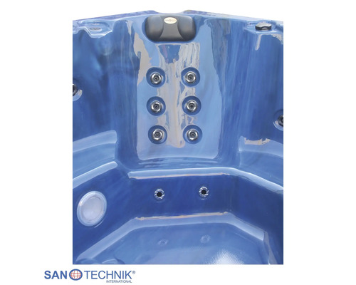 Innenansicht eines blauen Whirlpools mit Massagedüsen, Kopfstütze und integrierter Beleuchtung. San Technik International Logo.