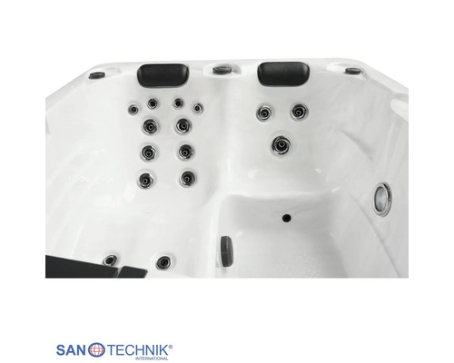 Innenansicht eines Whirlpools mit zahlreichen Massagedüsen und zwei Kopfstützen sowie Sanotechnik International Logo.
