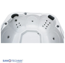 Innenansicht eines Whirlpools mit Massagedüsen und schwarzen Kopfstützen. Sanotechnik International Logo.