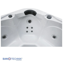 Sanotechnik Whirlpool-Badewanne mit Nackenstütze und Massagedüsen. Sanotechnik Logo.