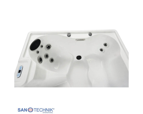 Innenansicht eines Whirlpools mit Massagedüsen, Bedienpanel, Kopfstütze und Sanotechnik International Logo.