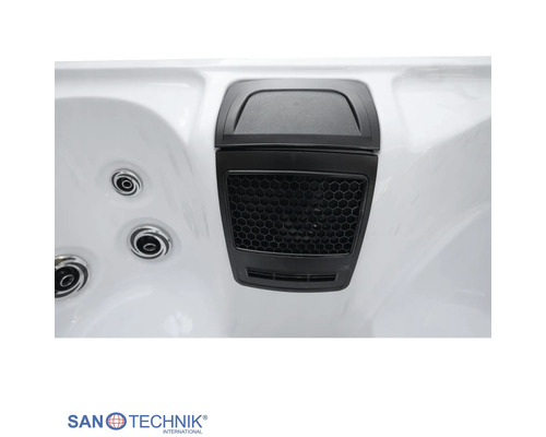 Detailansicht eines Whirlpools mit integrierter Lautsprecher- oder Filtereinheit und Massagedüsen. Sanotechnik Logo.