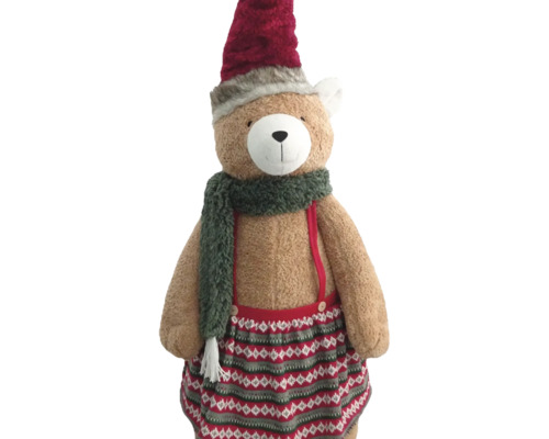 Plüsch-Teddybär mit roter Weihnachtsmütze, grünem Schal und gemustertem Rock mit Hosenträgern.