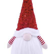 Weihnachts-Wichtel mit Paillettenmütze, weißem Bart und gestreiften Armen.