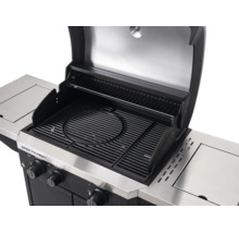 Geöffneter Tenneker Spectra Gasgrill mit gusseisernem Grillrost inklusive kreisförmigem Einsatz, Warmhalterost und Seitenablagen.