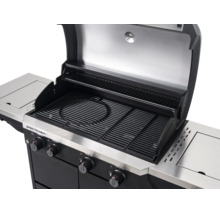 Geöffneter Spectra Gasgrill mit gusseisernen Grillrosten inklusive kreisförmigem Einsatz, Warmhalterost und vier Drehreglern.