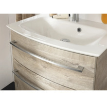 Waschtischunterschrank mit Keramikwaschbecken und zwei Laden in Eichenoptik mit Metallgriffen.