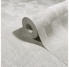 Rolle Vliestapete mit strukturiertem, geometrischem Fächermuster.