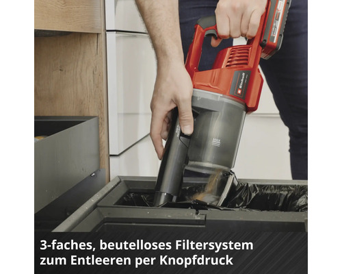 Einhell Akku-Handsauger wird per Knopfdruck über einem Mistkübel entleert.