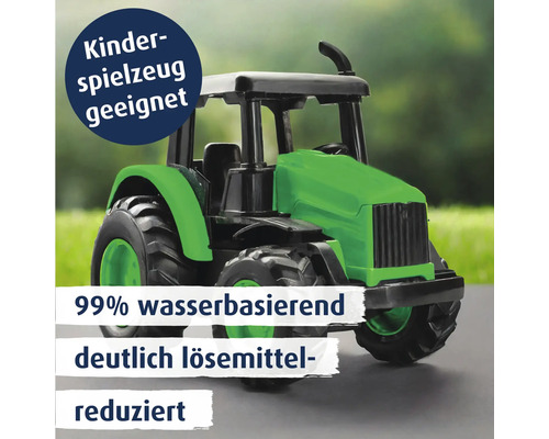 Spielzeugtraktor als Symbol für wasserbasierenden Lack, geeignet für Kinderspielzeug, lösemittelreduziert.