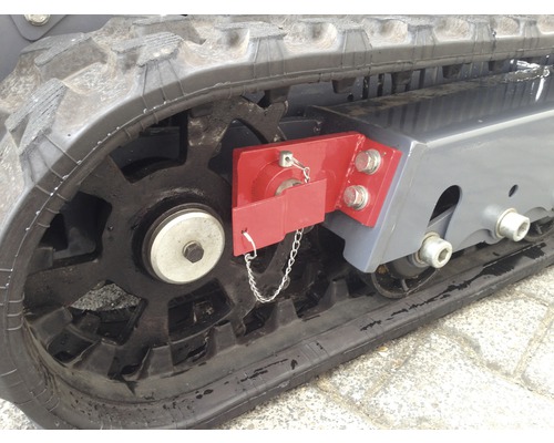 Detailansicht einer Kettenraupe an einer Baumaschine
