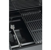 Innenraum eines Grills mit Grillrost und Brenner