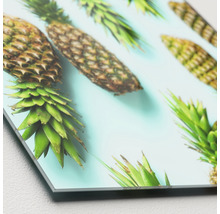 Dekoratives Bild mit Ananas Motiven auf einer Platte