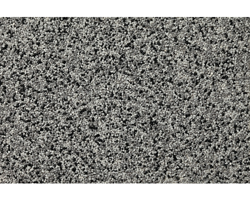 Nahaufnahme einer Putzoberfläche mit grauen und schwarzen Steinen